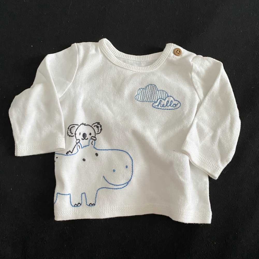 White and blue baby shirt